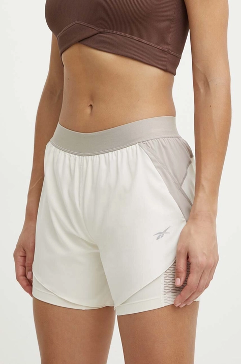 Běžecké šortky Reebok béžová barva, high waist, 100076065