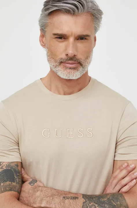 Хлопковая футболка Guess мужской цвет бежевый с аппликацией