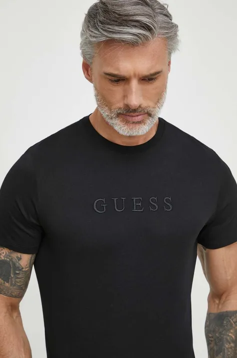Pamučna majica Guess za muškarce, boja: crna, s aplikacijom
