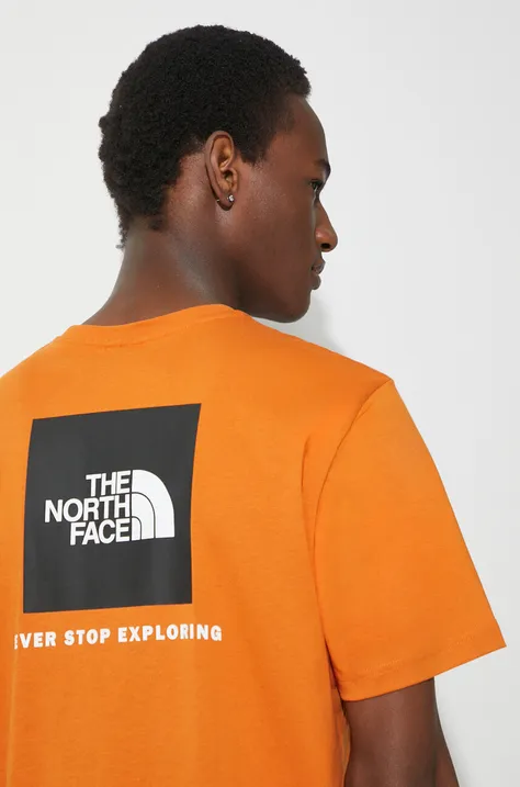 The North Face cotton t-shirt M S/S Redbox Tee men’s orange color with a print NF0A87NPPCO1