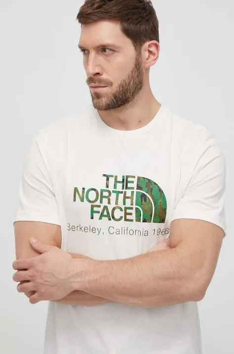 Памучна тениска The North Face в бежово с принт