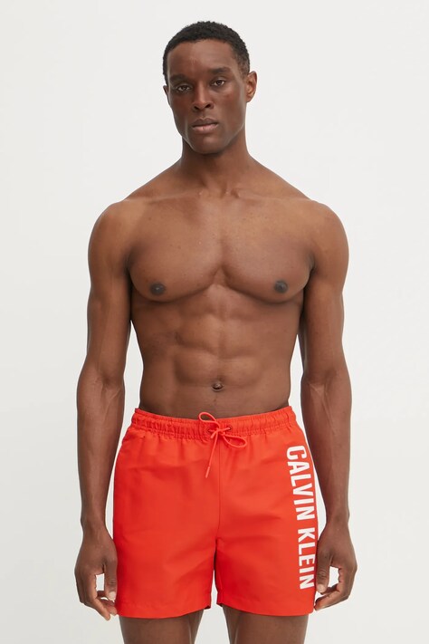 Plavkové šortky Calvin Klein červená barva, KM0KM01092