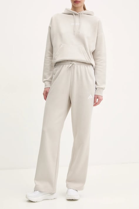 Tepláky adidas Essentials béžová barva, vzorované, JW9215