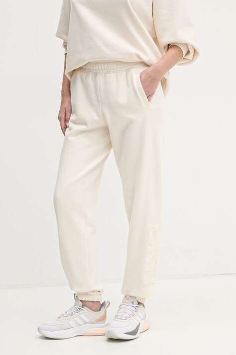 Спортивные штаны Dkny цвет бежевый с аппликацией DP5P3585