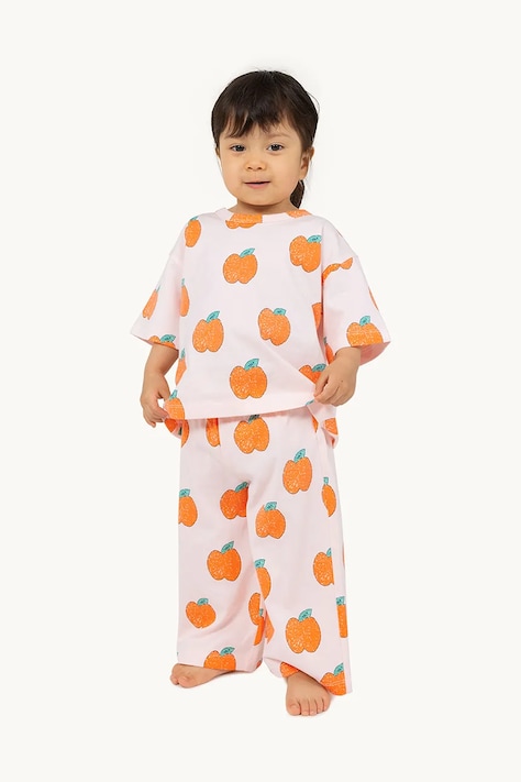 Дитячі бавовняні штанці Tinycottons APPLES BABY PANT колір жовтий з принтом SS25-039