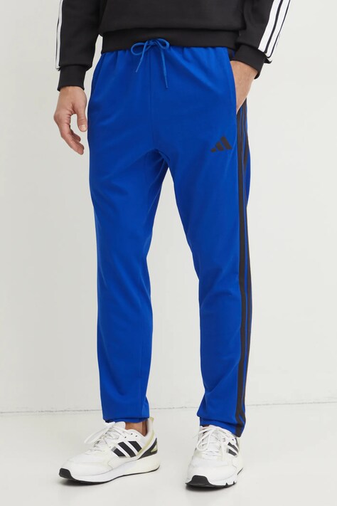 Tepláky adidas Essentials modrá barva, vzorované, JE6432