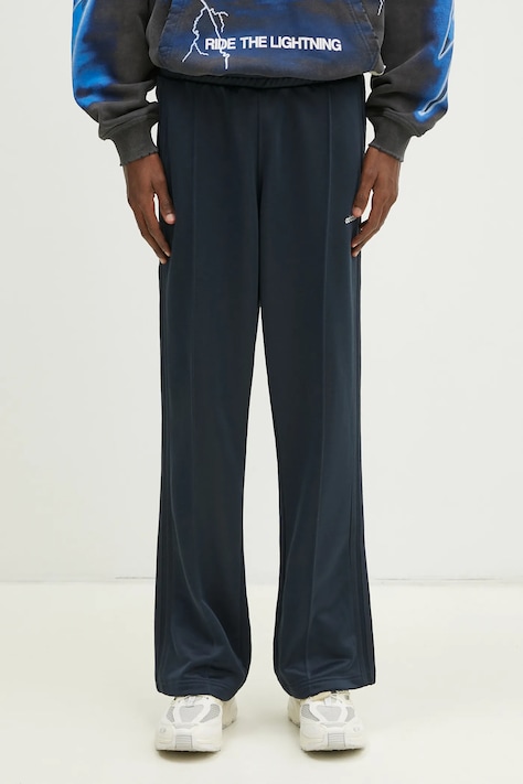 adidas Originals pantaloni della tuta Flare Pant uomo colore blu navy JC8382