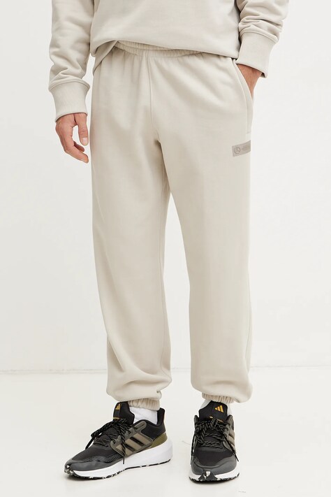 Bavlnené tepláky adidas x Mercedes béžová farba, jednofarebné, JW3083