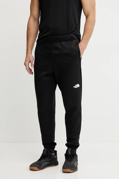 The North Face pantaloni de trening Reaxion culoarea negru, uni, NF0A8CNQJK31