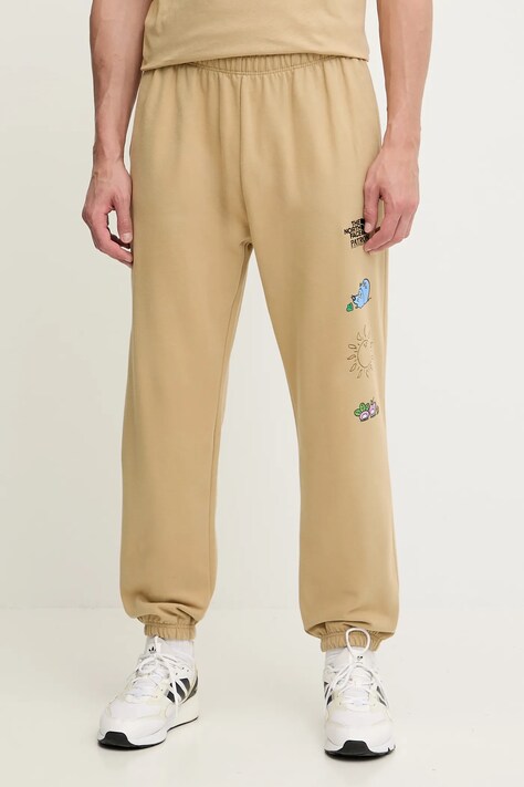 Pamučni donji dio trenirke The North Face Mountain Cleanup boja: zelena, s tiskom, NF0A8C2WLK51