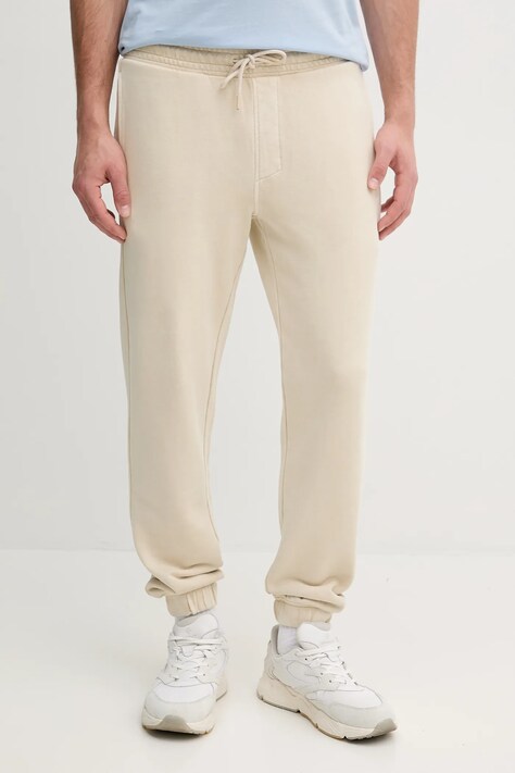 Calvin Klein Jeans pantaloni de trening din bumbac bărbați, culoarea bej, uni, J30J327252