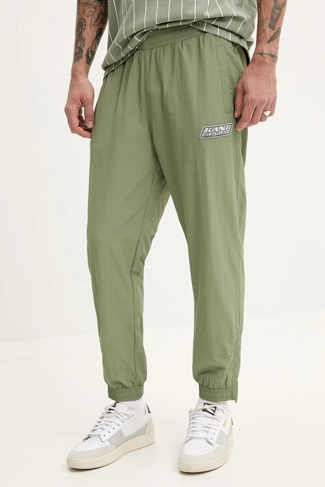 Karl Kani pantaloni de trening barbati, culoarea verde, cu imprimeu, 60060039