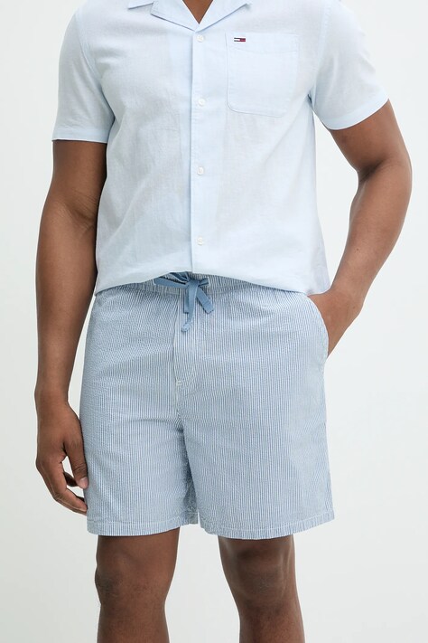 Bavlněné šortky Tommy Jeans pánské, modrá barva, DM0DM21946