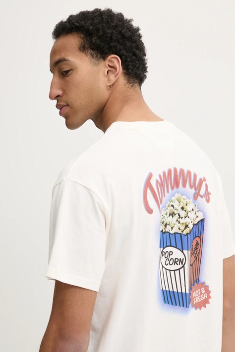 Памучна тениска Tommy Jeans в бежово с принт DM0DM20352