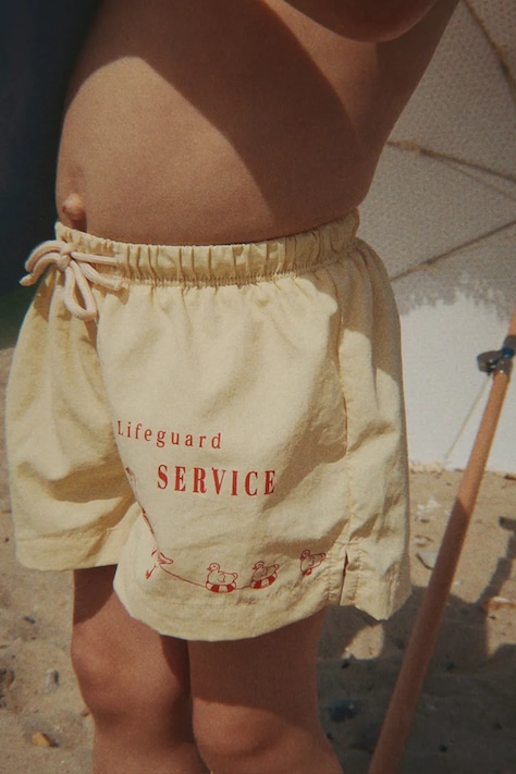 Konges Sløjd spodenki do pływania dziecięce POMIO SHORT SWIM SHORTS GRS żółte KS105523