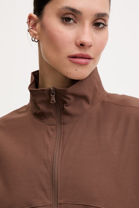 Under Armour куртка жіноча Unstoppable — SS26-BLD0KN, коричневий — фото 4