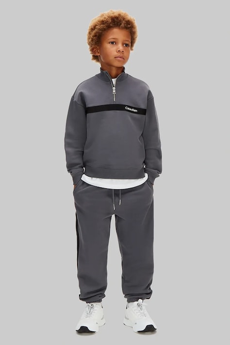 Detská bavlnená tepláková súprava Calvin Klein Jeans šedá farba, IB0IB02621
