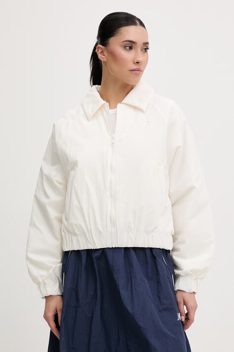 New Balance κοντό μπουφάν Γυναικείο Woven μπεζ WJ61D8YXSST