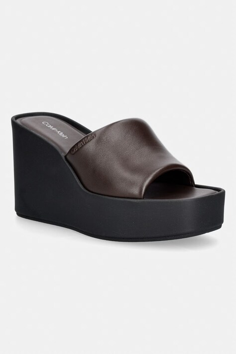 Calvin Klein klapki na koturnie damskie skórzane WEDGE 70 SNDL MULE LTH brązowe HW0HW02881