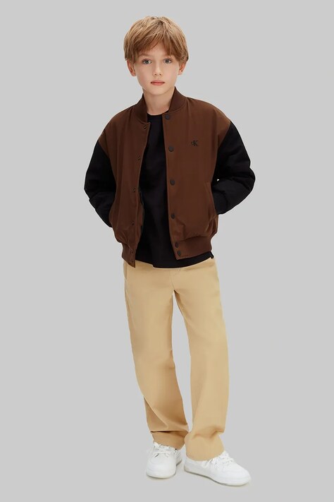 Детские брюки Calvin Klein Jeans цвет бежевый однотонные IB0IB02604