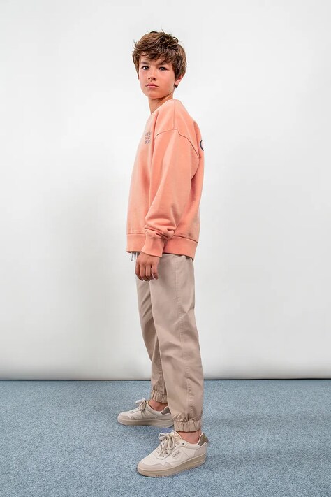 Mayoral spodnie joggery dziecięce z bawełną Boston by Mayoral beżowe regular waist 6574