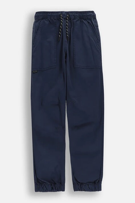 Coccodrillo spodnie dziecięce z bawełną niebieskie regular waist COLLECTION TROUSERS BOY