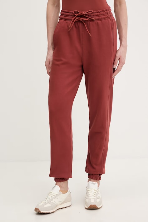 Бавовняні спортивні штани adidas by Stella McCartney колір помаранчевий з принтом JZ0660