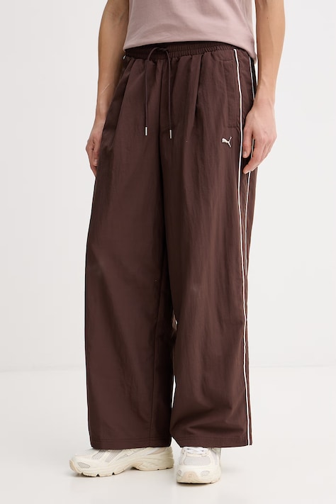 Spodnji del trenirke Puma Piping Relaxed Woven ženski, rjava barva, 634559