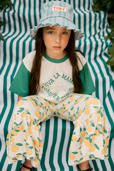 Tinycottons spodnie dziecięce ORANGES PANT kolor żółty wzorzyste SS26-028