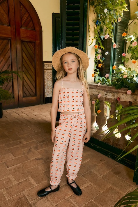 Tinycottons spodnie bawełniane dziecięce CHERRIES PANT kolor różowy wzorzyste SS26-276