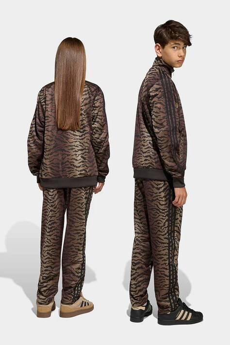 adidas Originals spodnie dresowe dziecięce kolor brązowy wzorzyste KD3200