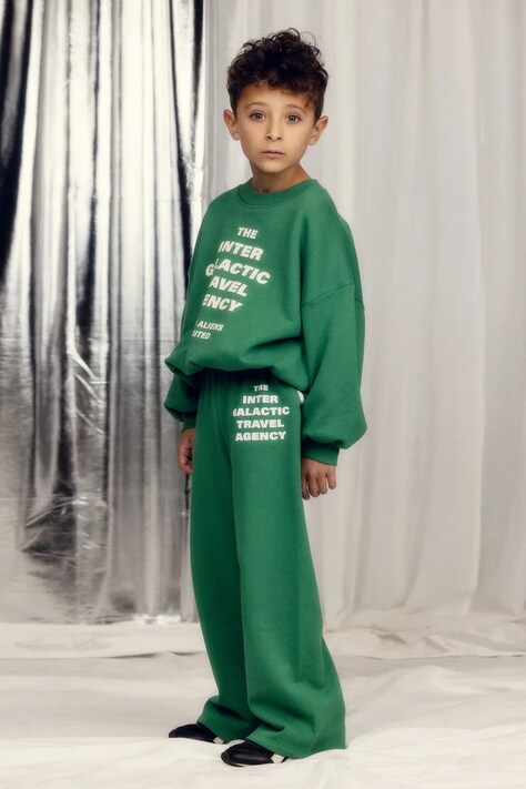 Mini Rodini spodnie dresowe bawełniane dziecięce Travel agency kolor zielony z nadrukiem 26230144