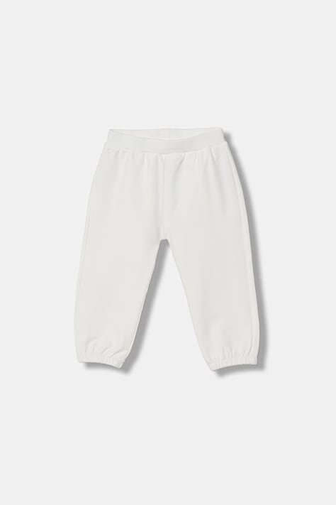 United Colors of Benetton spodnie dresowe dziecięce bawełniane z elastanem beżowe regular waist 35FNAF029