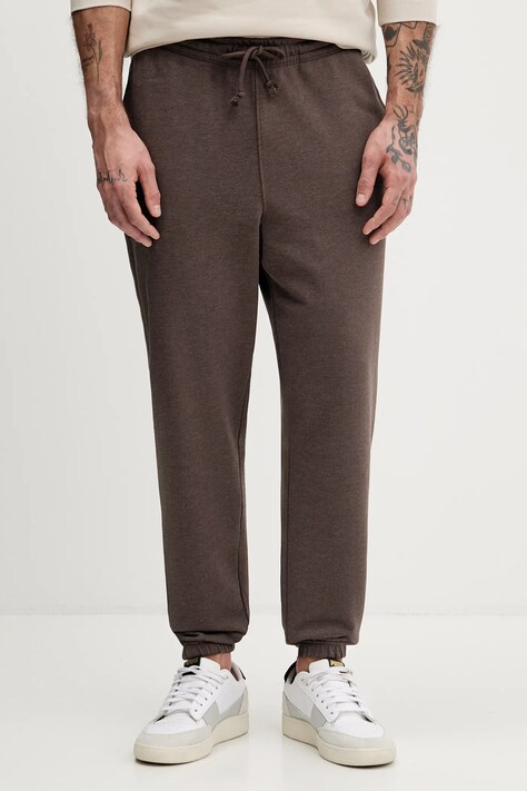 Tommy Jeans spodnie dresowe kolor brązowy melanżowe DM0DM22358