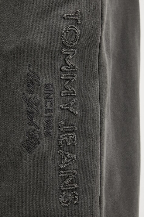 Tommy Jeans spodnie dresowe bawełniane męskie kolor czarny melanżowe DM0DM22360