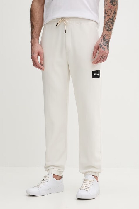 HUGO spodnie dresowe bawełniane Daylony męskie kolor beżowy gładkie 50557453