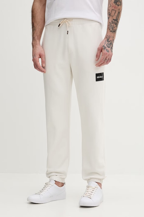HUGO spodnie dresowe bawełniane Daylony męskie kolor beżowy gładkie 50557453