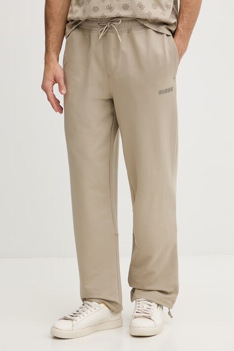 Guess spodnie dresowe męskie GUSTAVE beżowe regular waist Z6GB01 K2834