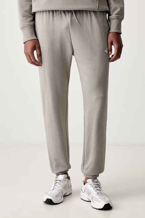 The North Face spodnie dresowe męskie z bawełną Simple Dome szare regular waist NF0A8C412MB1