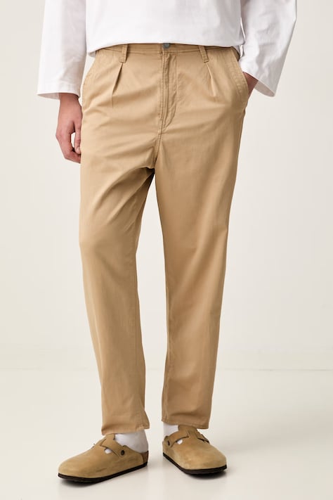 G-Star spodnie chinos męskie z bawełną Pleated Chino Relaxed Tapered beżowe high waist D24543-D910