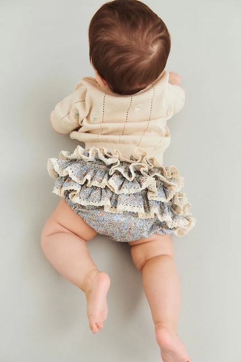 Wheat szorty bawełniane niemowlęce kolor niebieski wzorzyste 5049-223-GOTS