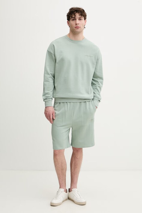 Tommy Hilfiger teplákové šortky pánské s bavlnou zelené UM0UM03914