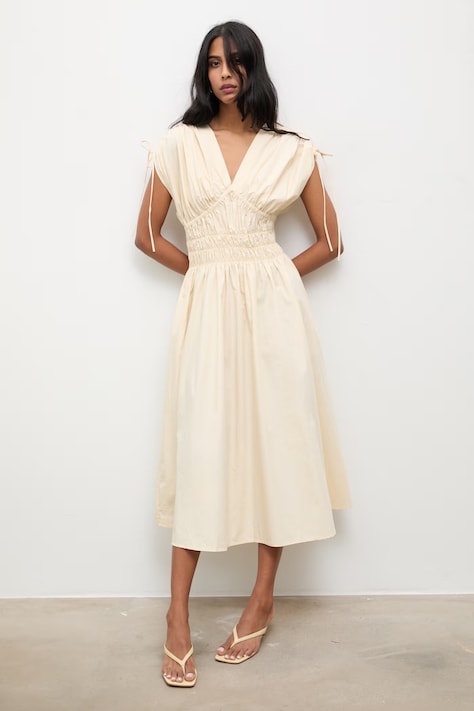 Answear.LAB sukienka bawełniana kolor żółty midi rozkloszowana