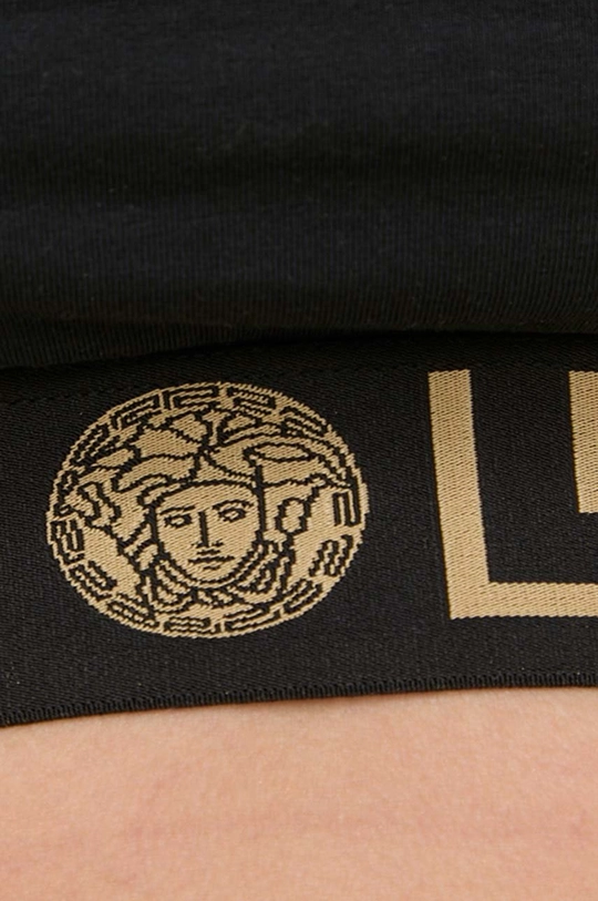 Podprsenka Versace  1. látka: 94 % Bavlna, 6 % Elastan 2. látka: 82 % Polyamid, 18 % Elastan 3. látka: 82 % Polyester, 9 % Elastan, 9 % Polyamid