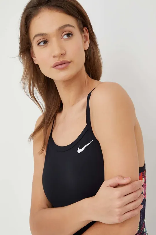 Jednodielne plavky Nike  Základná látka: 100 % Polyester Podšívka: 50 % Polyester, 50 % Recyklovaný polyester