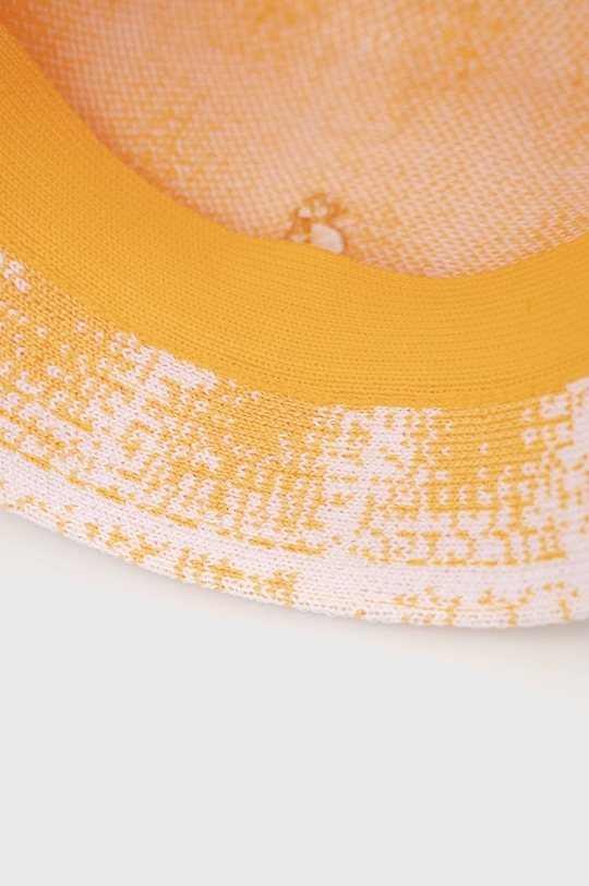 yellow Kangol hat