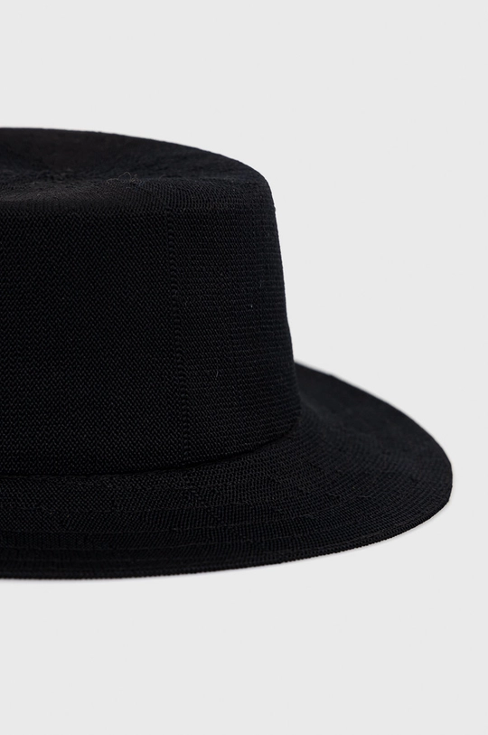 Šešir Kangol  Temeljni materijal: 64% Modakril, 36% Poliester Traka: 100% Najlon