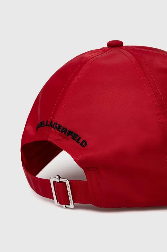 Kapa s šiltom Karl Lagerfeld Glavni material: 100 % Poliamid Podloga: 96 % Poliester, 4 % Bombaž