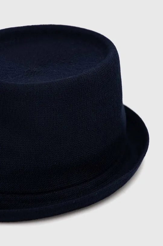 Καπέλο Kangol  Κύριο υλικό: 65% Βισκόζη μπαμπού, 35% Μοδακρύλιο Άλλα υλικά: 100% Νάιλον