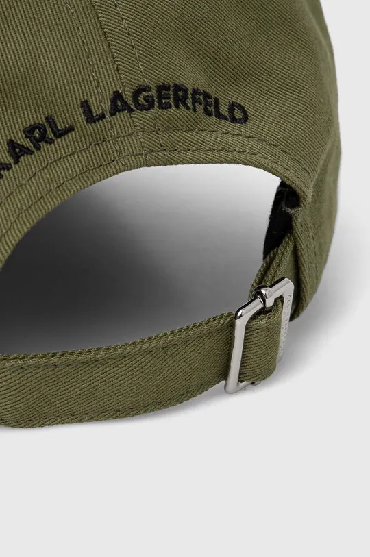 Kapa s šiltom Karl Lagerfeld Material 1: 50 % Bombaž, 50 % Recikliran bombaž Material 2: 96 % Poliester, 4 % Elastan